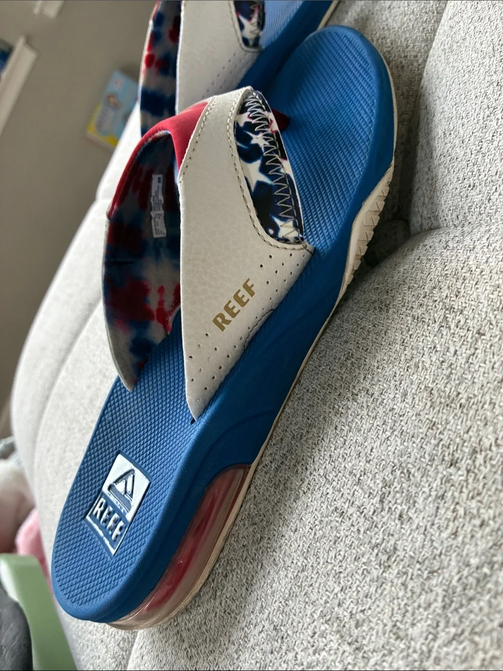 Reef Blue Navy Flip Flops with Red and White Accents